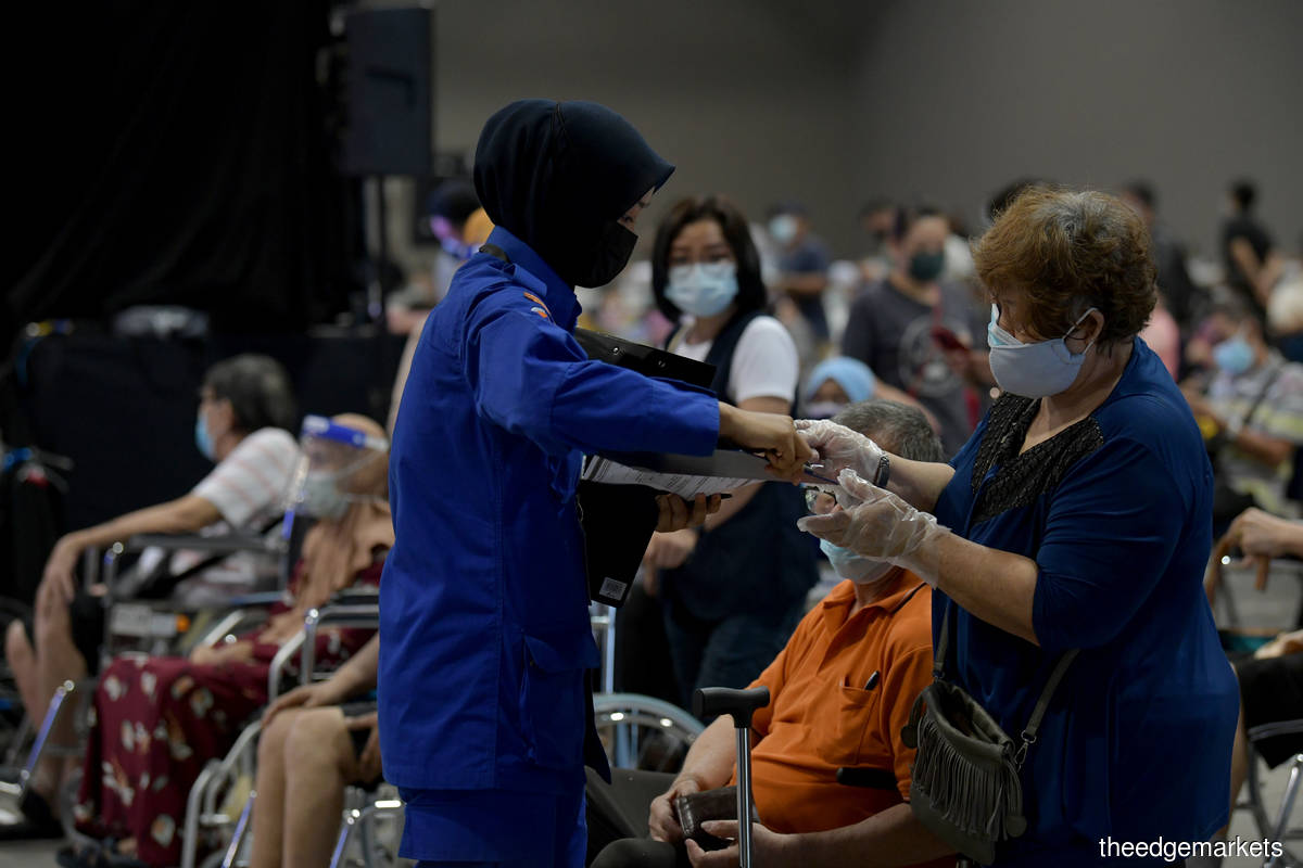 A look at the Malaysia International Trade and Exhibition Centre (MITEC) vaccination centre (PPV) yesterday. The government targets to administer 150,000 doses daily by the end of June. (Photo by Mohd Suhaimi Mohamed Yusuf/The Edge)